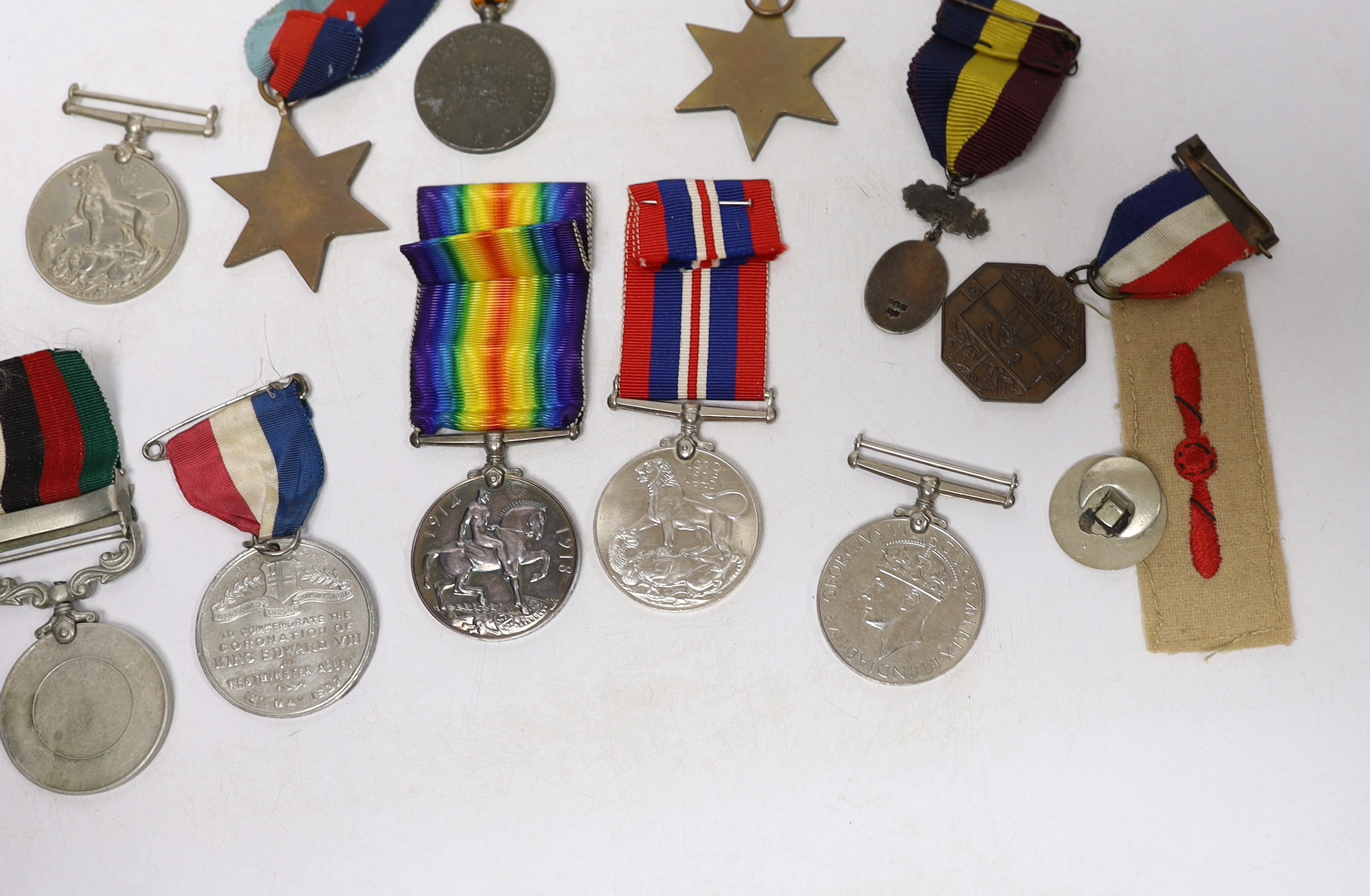 Twelve medals including; a British War Medal, a Victory Medal, three 1939-45 War Medals, two 1939-45 Stars, an Edward VIII Coronation Medal, a Soviet Stalin Victory medal, a Pakistan General Service Medal, a George VI Co